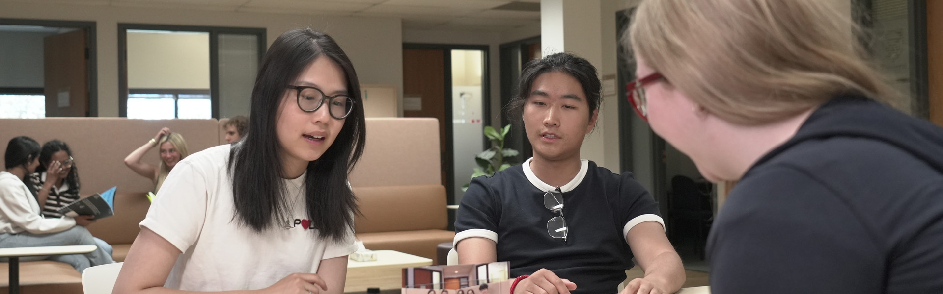Students speak in the Global Lounge