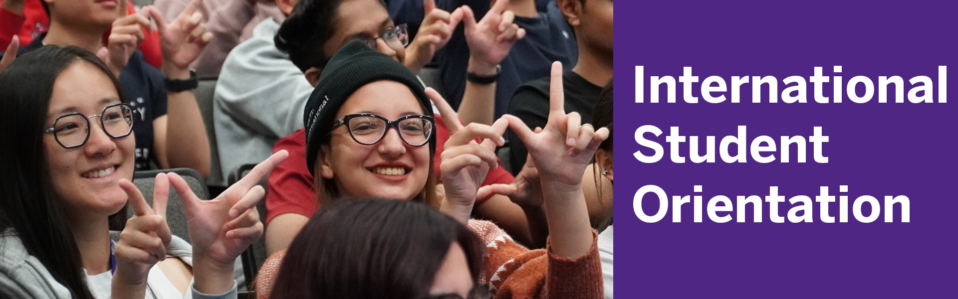 Students smiling with the text "International Student Orientation"
